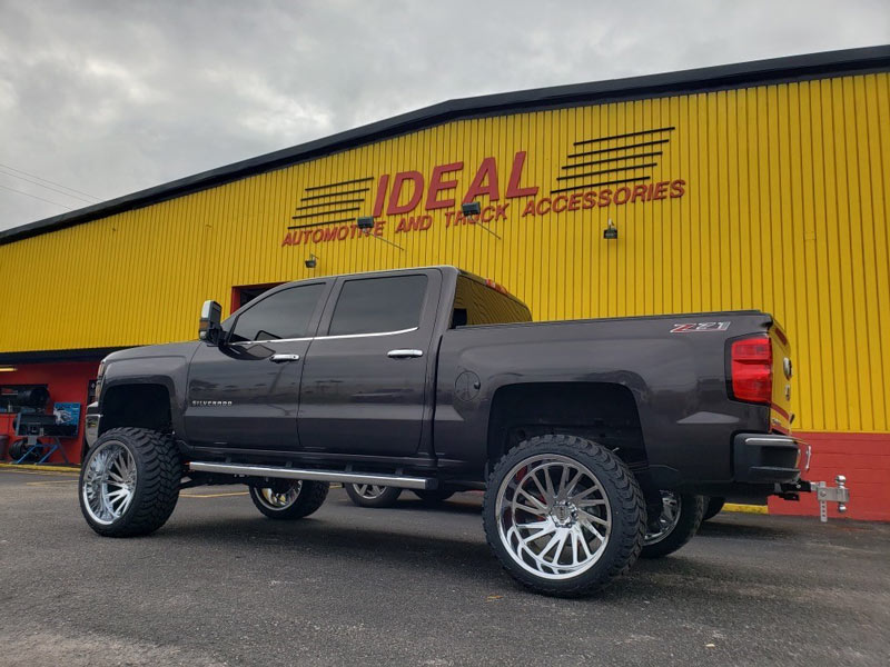 Black lifted Chevrolet truck