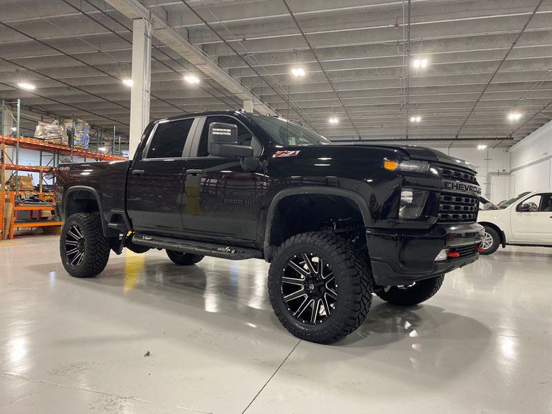 Lifted Jeep Mojave in workshop